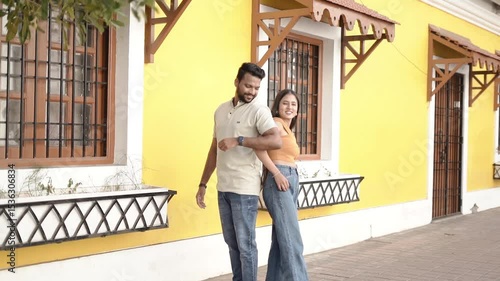 Wallpaper Mural Happy Young Couple Posing Playfully Against street city Torontodigital.ca