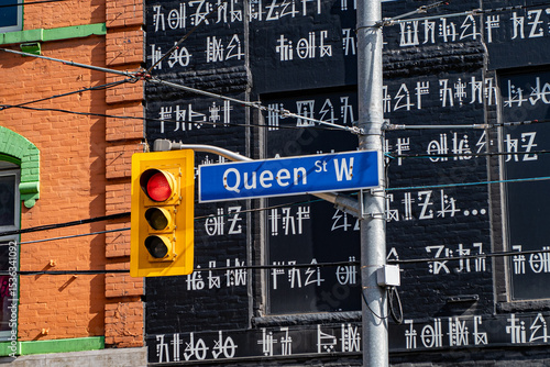 Photography Signage view of Queen Street West in Toronto.