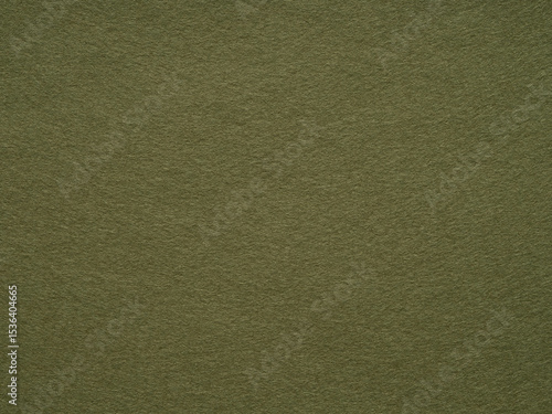 Uniform olive green felt texture offers a canvas of natural elegance and minimalist design