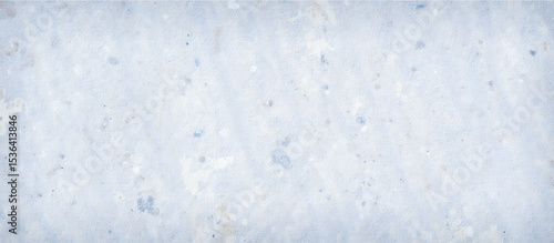 Light blue grunge wall texture with spots and stains. Abstract old cement or plaster background for design and wallpaper