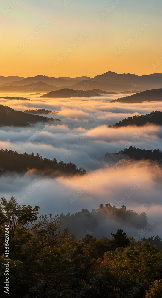 Obraz premium Morning Fog Rolling Through Mountain Valley at Sunrise