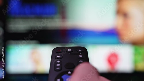 Streaming Service Internet Online Cinema Smart TV. Hand Holding the TV Remote Control Surfing Smart Television and then Turn off Smart TV