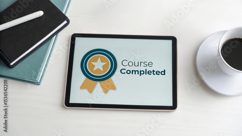 Online learning certification program concept. Course completion certificate displayed on a tablet with coffee and notebook.