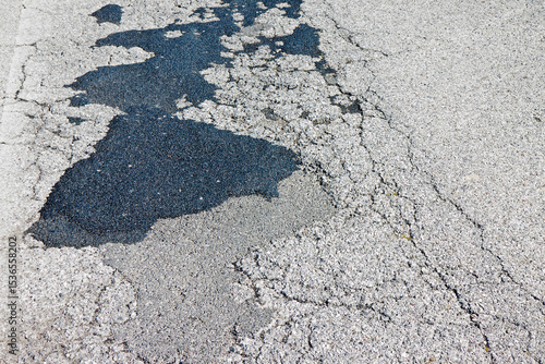 Quadro em tela Old damaged, dangerous and broken asphalt road background