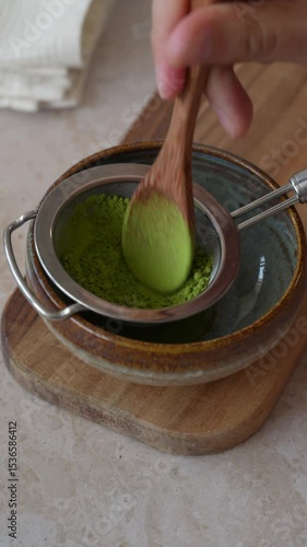 Whisking matcha powder for matcha latte  