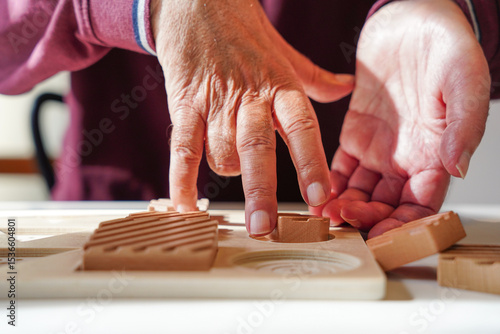 Close-up of hands in cognitive therapy