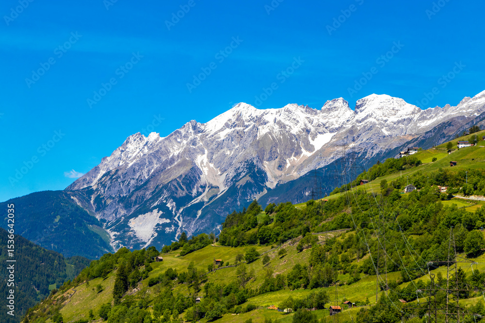 Obraz premium Lechtal Austria alpine mountain landscape panorama blue sky and snow.