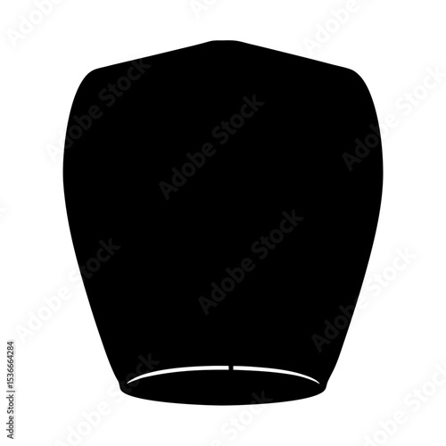 Silhouette of a traditional Chinese sky lantern or Kongming lantern with light