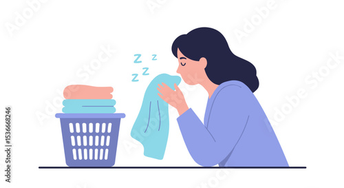 Woman smelling fresh laundry from basket while relaxing at home