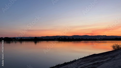 sunset over the river. riverbank embankment