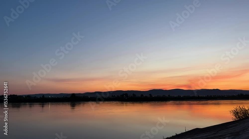 sunset over the river. riverbank embankment