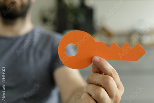 Image of a person holding a...