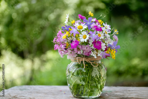 Wallpaper Mural Beautiful bouquet of summer wild flowers in a green garden Torontodigital.ca