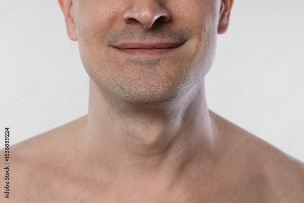 Obraz premium Man after shaving on white background, closeup