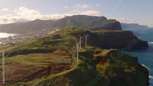 Explore stunning cliffs and wind farms in Madeira showcasing breathtaking coastal views and natural beauty at sunrise
