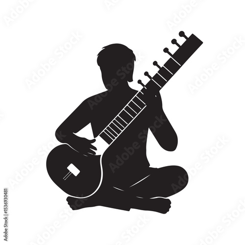 Silhouette of Person Playing Sitar in Traditional Seated Position