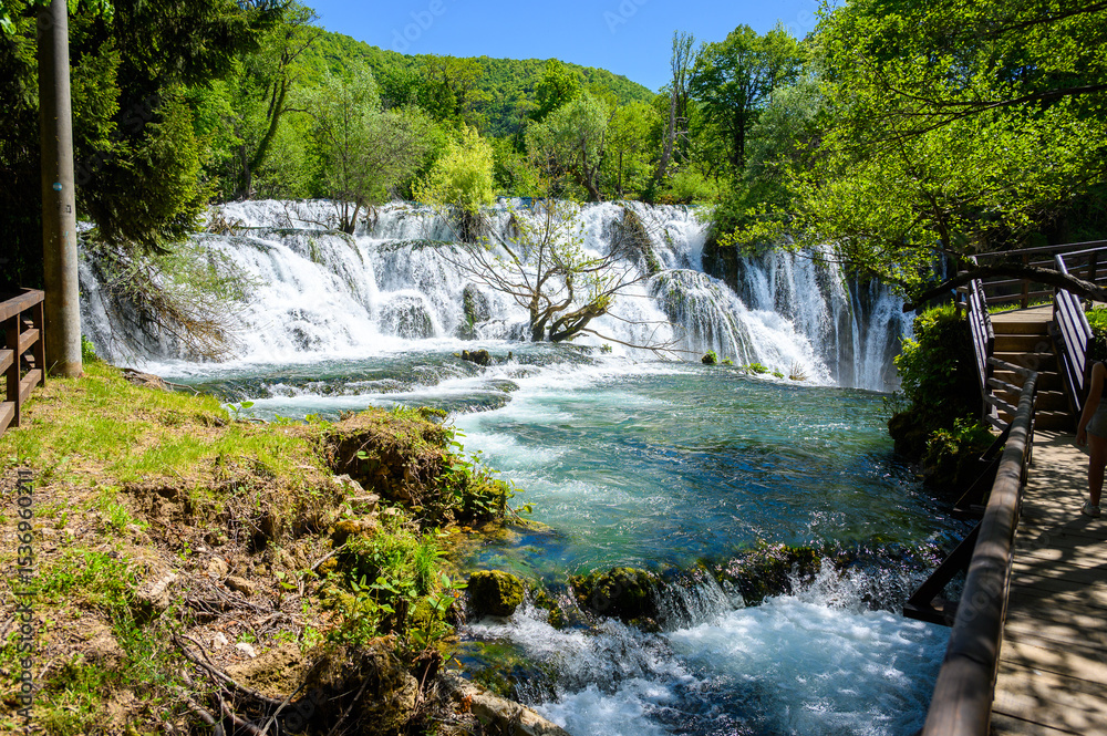 Fototapeta premium Amazing Martin Brod waterfalls on river Una in Bosnia and Herzegovina. Beautiful nature in Una national park with crystal clear water and amazing cascade waterfalls.