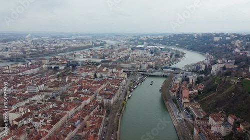 Wallpaper Mural Aerial view of Saone river flowing through Lyon cityscape in Auvergne Rhone Alpes region, France in a cloudy day over this tourist destination Torontodigital.ca