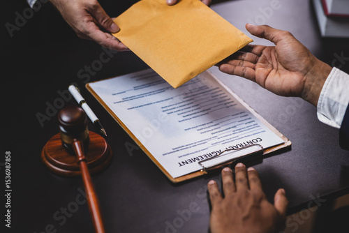 Tableau sur toile Lawyer receiving envelope with money for bribery
