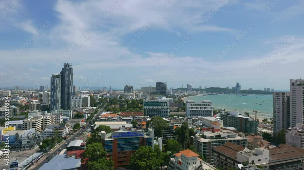 Panoramic View of Coastal City Skyline with Buildings and Ocean Panoramic View of Coastal City Skyline with Buildings and Ocean