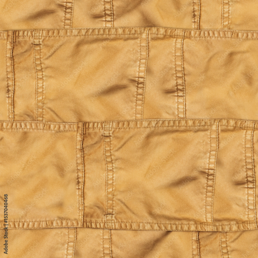 Naklejka premium Seamless 4k photo texture of light brown denim sewn cloth with stitches.