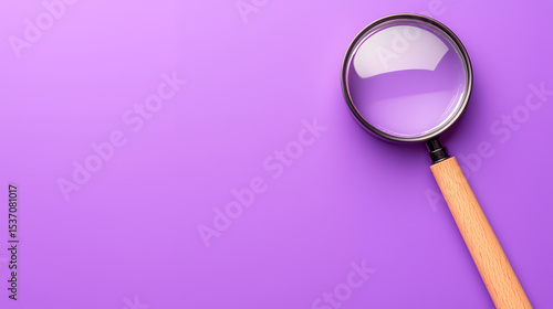 magnifying glass on purple background
