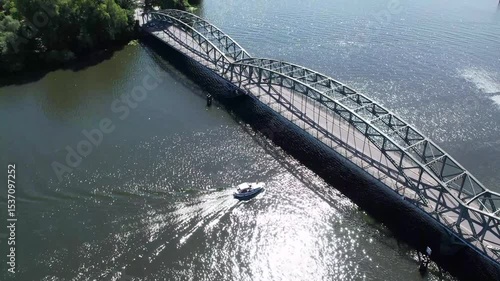 Berlin Spandau Aerial view of a riverside promenade with small boats docked along the edge