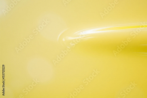 Pale Yellow Liquid Swirl Abstract Background Texture Smooth Flowing Cream Paste Dairy Product Design Element