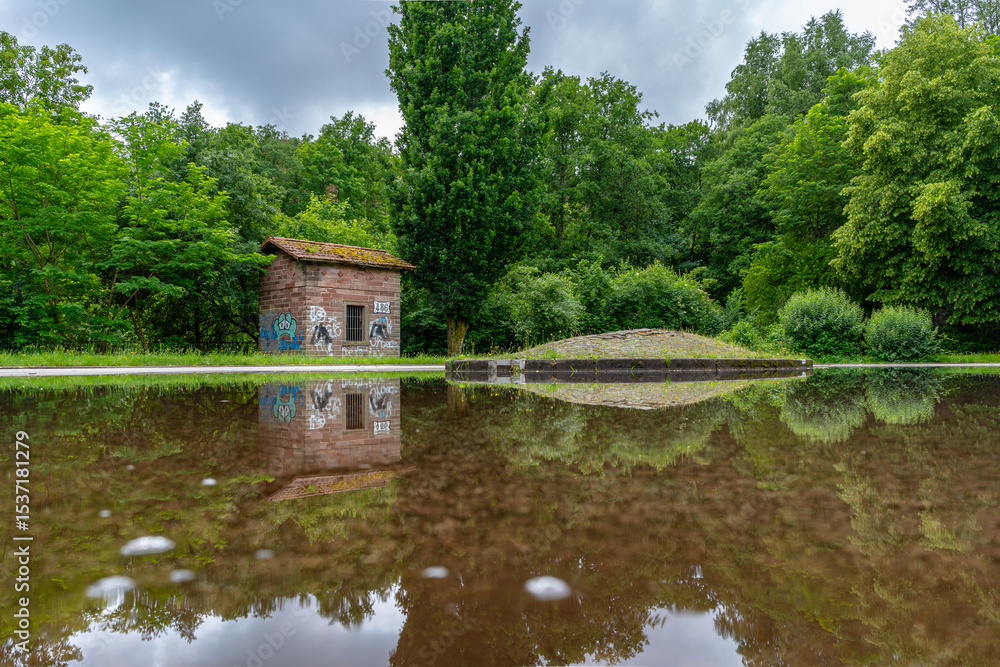 Obraz premium reflection of a tiny little old house