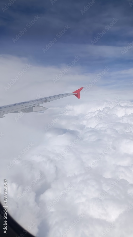 Fototapeta premium Peaceful Sky from Airplane Window Seat