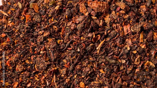 texture of dried tomato powder closeup, spice or seasoning as background