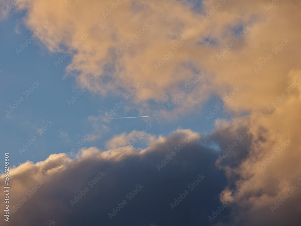Fototapeta premium clouds in the sky with aeroplane line 