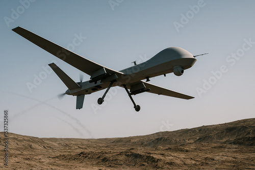 Desert Shadow: Combat Drone on Low Reconnaissance Flight Over Barren Land
