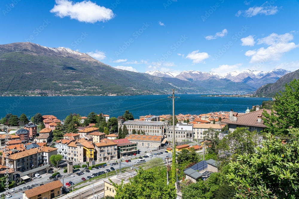 Fototapeta premium Lake Como scenic view with town and mountains.