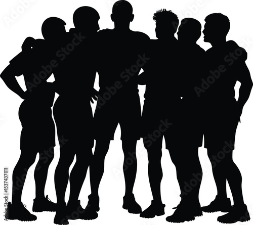 Silhouette of a group of sportsmen huddled together in teamwork and support