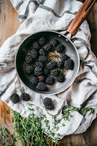 Fresh Blackberries in a Pan With Herbs on a Wooden Surface Showcase Seasonal ...