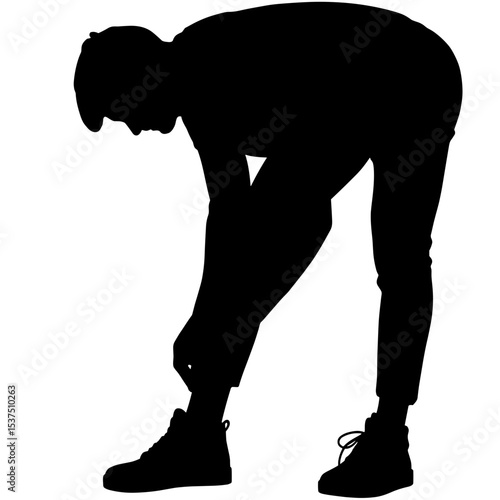 Silhouette of man lacing sneakers, modern casual style