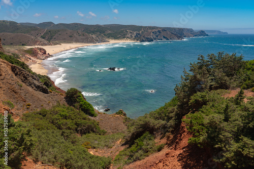 Landscape of the Amado beach since lookout in a sunny day, Carrapateira, Portugal.