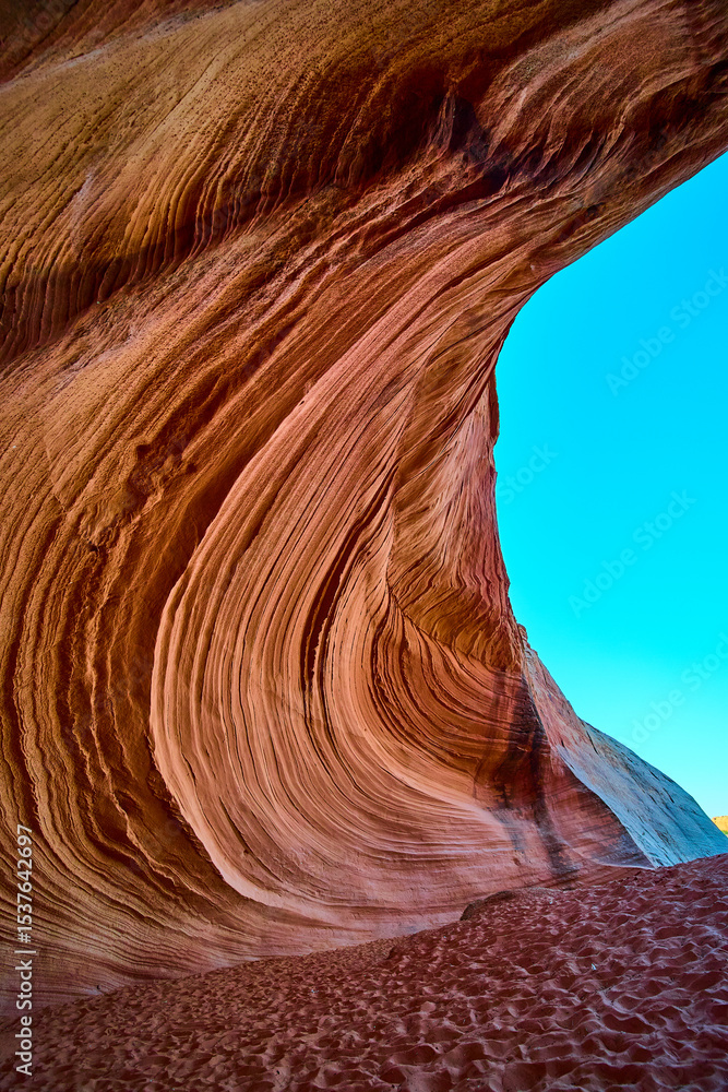 Obraz premium Sandstone Wave Motion and Canyon Walls with Sandy Floor Low Angle Perspective