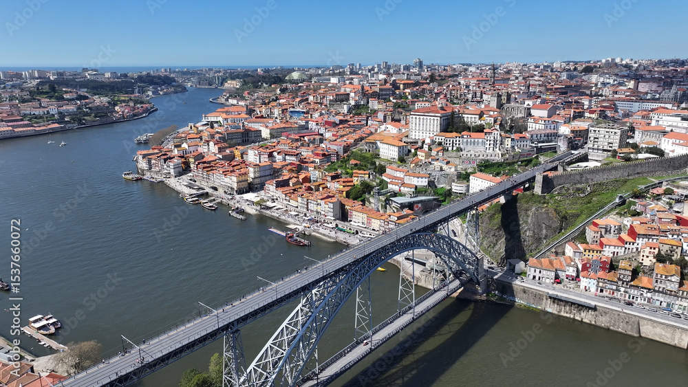 Obraz premium Porto Skyline At Porto In District Of Porto Portugal. Coastal City. Luis I Bridge Landscape. Boat Sailing. Porto Skyline In Portugal. Portugal Skyline. Travel Landscape.