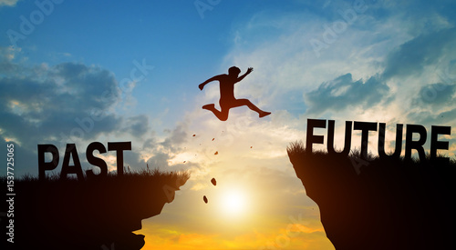Foto Silhouette man jumping from PAST to FUTURE wording on cliffs with cloud sky and sunrise