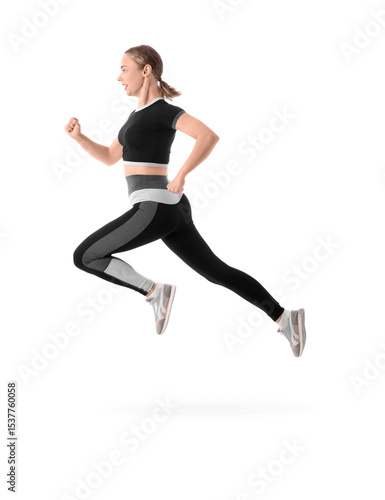 Sporty young woman running marathon on white background
