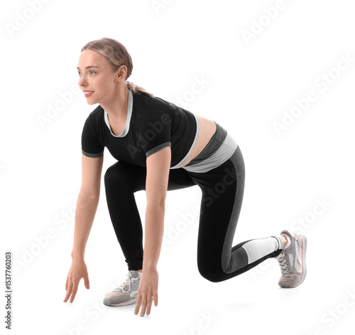 Sporty young woman preparin...