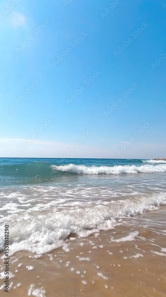 A serene beach scene with soft waves gently lapping the shore A serene beach scene with soft waves gently lapping the shore