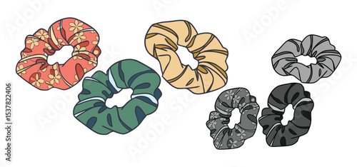 A collection of fashionable scrunchies with floral patterns in a variety of vibrant colors on a white background