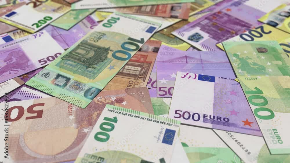 A large pile of scattered euro banknotes of various denominations, HD footage. A large pile of scattered euro banknotes of various denominations, HD footage.