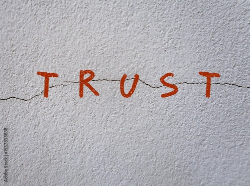 Slika na platnu Gray wall with text written TRUST on crack - means trust is broken - when someone we trust break expectations or promises made within relationship - Betrayal leading to insecurity and emotional pain