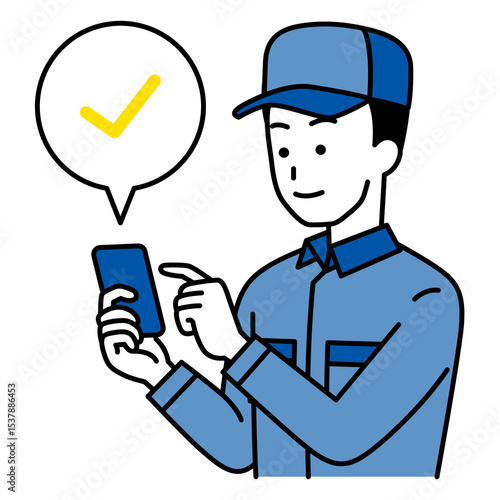 スマートフォンで確認をするつなぎ作業服の男性