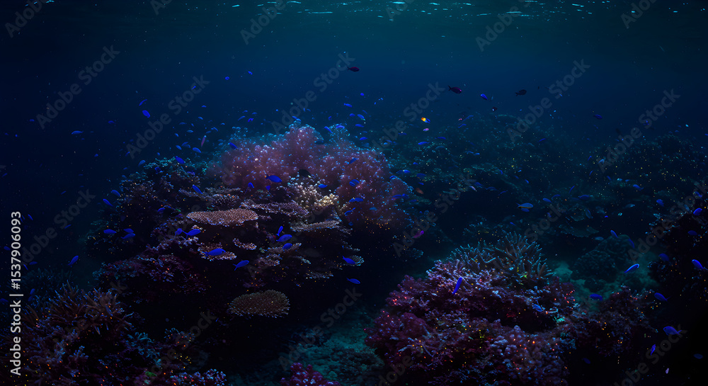 Fototapeta premium Underwater Coral Reef Ecosystem with Colorful Fish in a Deep Blue Ocean
