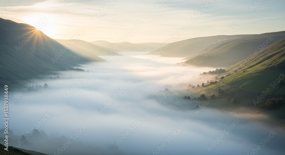 Fototapeta premium Sunrise Over Misty Mountain Valley: Breathtaking Landscape Photography